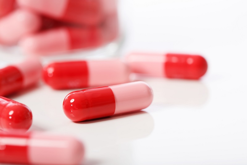 Red and pink capsules